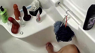 Pawg milf toys pussy in the shower