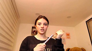 Amateur redhead poses and masturbates with toys