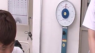 Japanese Nurse Masturbates in Front of a Patient While Doctor Plays with Her Tits