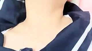 Asian amateur in maid uniform