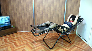 A Woman Is Restrained and Teased with Erotic Lotion
