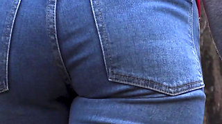 MILF In Blue Jeans Bends Over And Flashing Her Big Ass Outdoors