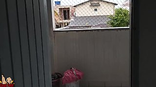 Wearing Micro Bikini On Balcony For A Worker See