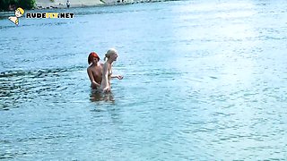 Skinny and young nudist ladies fool around on the beach