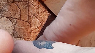Three girlfriends masturbate in the kitchen in the hostel close-up