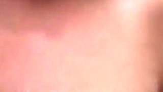 Redhead sucks two cocks in threesome and gets a warm load on her tits