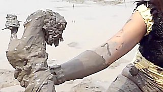 two thai girls in mud