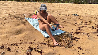 A Busty Blonde Is Walking and Sunbathing Naked