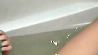 Brunette Babe Fingers Wet Pussy to Explosive Orgasm in Tub