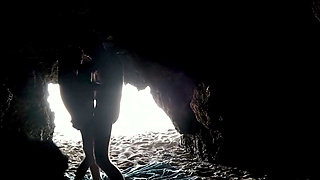 Couple recorded at the beach, inside the cave