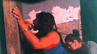 Two Hookers Take Turns Sucking Cock at Gloryhole