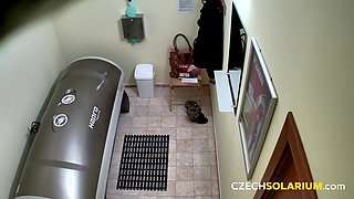 Czech Solarium 15: Busty Young Woman Exposes Everything Without a Care