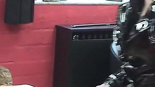 Purple-haired Dominatrix Whips Her Bound Slave Hard