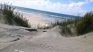 Exhibitionist Strokes Hard on the Beach