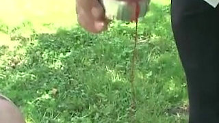 Humiliated wax play threesome in the forest