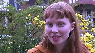 Sexy redhead stunner uses a gigantic fake penis for solo