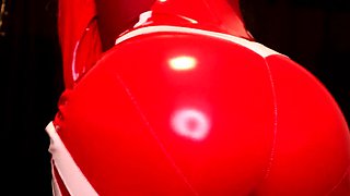 Femdom MILF vixen in red latex bodysuit plays with herself