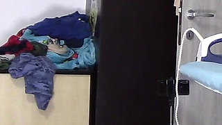 Amateur Wife Dancing Naked at Home. Amateur Woman Has Fun Trying on Clothes and Cutting Them.