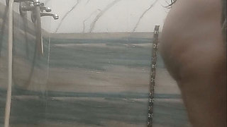 Hot housewife taking shower