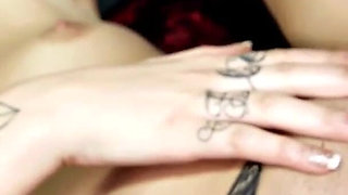 Tattooed brunette babe with nice tits is getting plowed on the bed