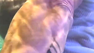 Amazon Kandy Flexes Her Massive Biceps in Her Hotel Pool