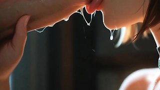 Black bob haired girl deepthroats cock in dim window room