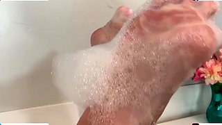 Hot babe with perfect big boobs taking shower