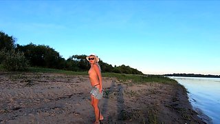 Russian Nudist on the River Shore