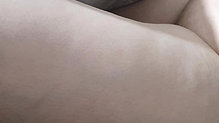 Step mom hand on step son leg close to hus dick