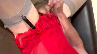 Sexy pink high heels with red corset playing