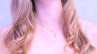 She Shows off Her Pink Pussy in a Doggy Style Position