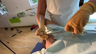 Dominatrix mistress April - clinical cock sewing