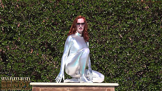 Bending in a Silver Spandex Suit