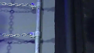 Lady Valeska and Miss Patricia have their sub over a bench.