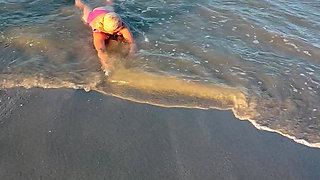 Try Not to Wet My Hair While Play with the Waves