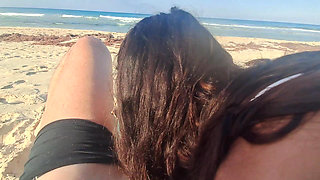 MILF Sucks Cock and Swallows Cum on the Beach POV