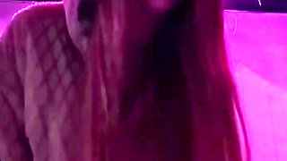 Smoking a Cigarette Outdoor While Wearing Only a Bikini and a Jacket