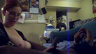Redhead With Glasses And Big Tits Giving A Long Blowjob To