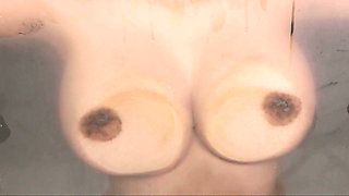 Kendra Roll with big tits fucks herself solo in the shower