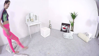 Teen gymnast stretching