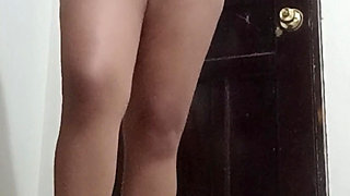 My aunty naked, changing clothes in her room.