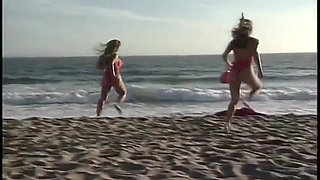 This tall redheaded lifeguard is showing her knockers and fucking her boyfriend