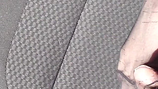 Feet of Nylonjunge in Pantyhose in Car