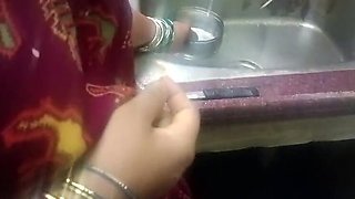 Desi Aunty Fingering and Sex with Boy in Kitchen - Homemade Indian MILF
