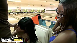 Tattooed ebony Jayla Foxx sucks dick between frames in a bowling alley group fuck