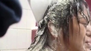 Asian girl gets a piss bukkake