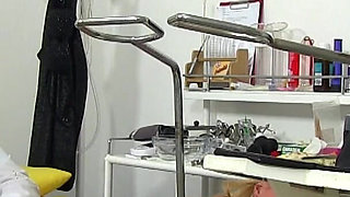 Young slut Eliss Fire caught on her kinky gyno exam by filthy gynecologist