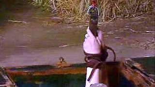 Pink labia close up of naive brunette playing with her name