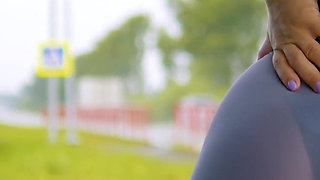 144 Goddess Anya in Tight Spandex: Provocative Leggings Tease at Bus Stop