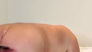 Young domme canes her slave